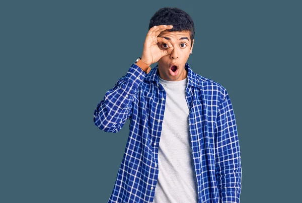 Young African Amercian Man Wearing Casual Clothes Doing Gesture Shocked — Stock Photo, Image