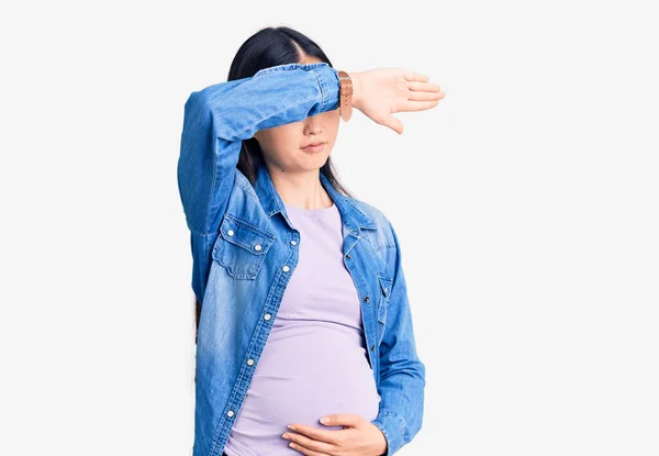 Young Beautiful Chinese Woman Pregnant Expecting Baby Covering Eyes Arm — Stock Photo, Image