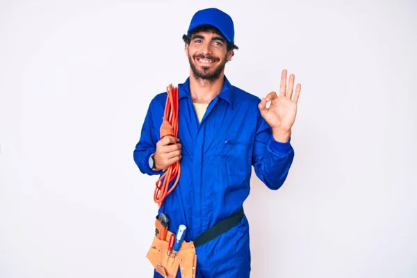 Handsome Young Man Curly Hair Bear Wearing Builder Jumpsuit Uniform — Stock Photo, Image