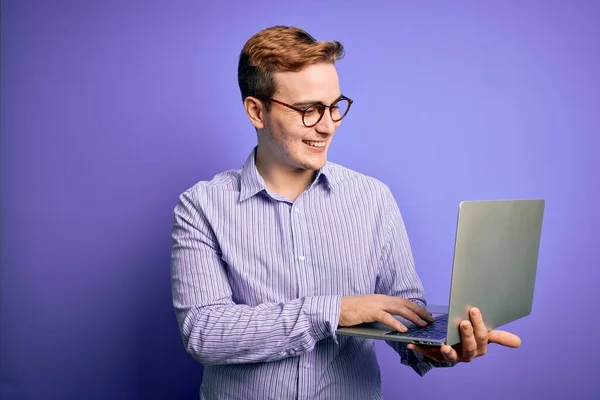 Young Handsome Redhead Businessman Working Using Laptop Purple Background Happy — Stock Photo, Image