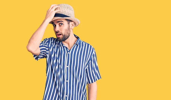 Young Handsome Man Beard Wearing Summer Hat Striped Shirt Surprised — Stock Photo, Image