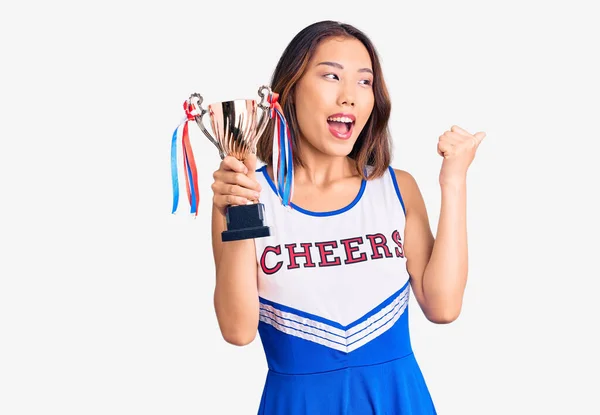 Youn Beautiful Asian Girl Wearing Cheerleader Uniform Holding Champion Trophy — Stock Photo, Image