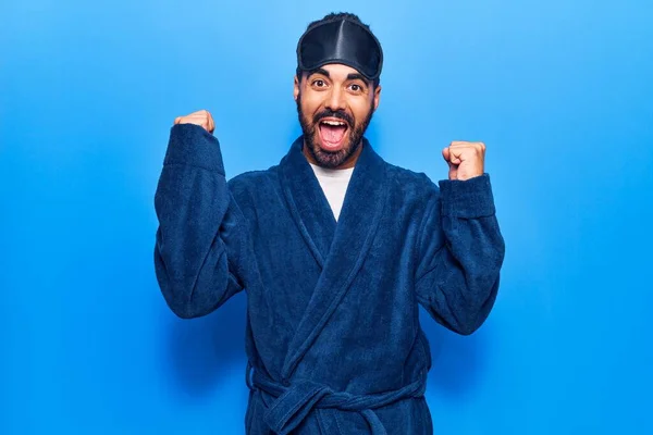 Young Hispanic Man Wearing Sleep Mask Robe Screaming Proud Celebrating — Stock Photo, Image