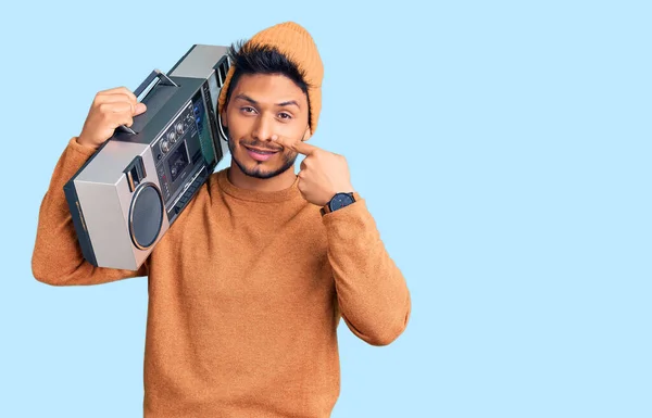 Handsome Latin American Young Man Holding Boombox Listening Music Pointing — Stock Photo, Image