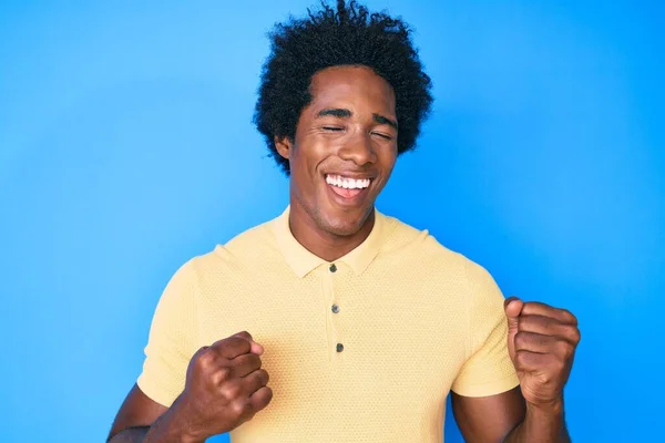 Handsome African American Man Afro Hair Wearing Casual Clothes Celebrating — Stock Photo, Image