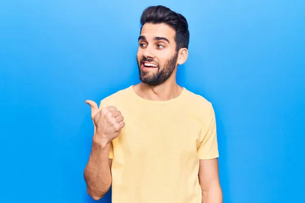 Young Handsome Man Beard Wearing Casual Shirt Pointing Thumb Side — Stock Photo, Image