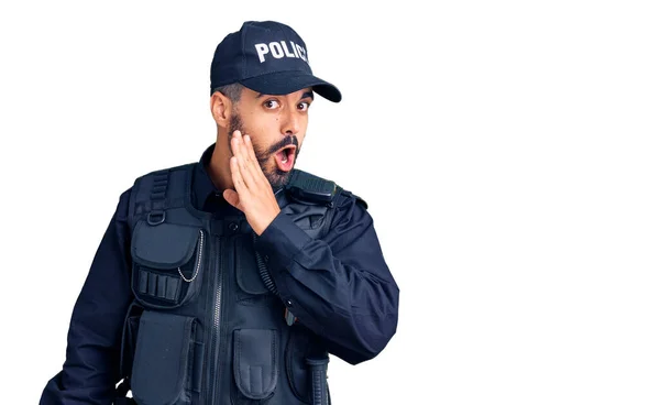Young Hispanic Man Wearing Police Uniform Hand Mouth Telling Secret — Stock Photo, Image