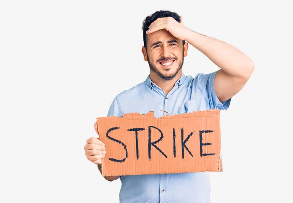 Young Hispanic Man Holding Strike Banner Cardboard Stressed Frustrated Hand — Stock Photo, Image