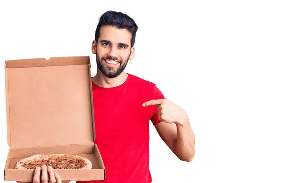 Young Handsome Man Beard Holding Delivery Cardoboard Italian Pizza Pointing — Stock Photo, Image