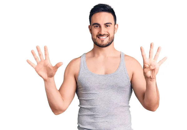 Homem Bonito Jovem Vestindo Roupa Banho Camiseta Sem Mangas Mostrando — Fotografia de Stock