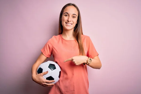 Young Beautiful Player Woman Playing Soccer Holding Football Ball Pink — Stock Photo, Image