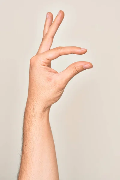 Mão Jovem Caucasiano Mostrando Dedos Sobre Fundo Branco Isolado Pegando — Fotografia de Stock