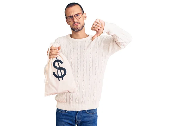 Jovem Homem Bonito Segurando Saco Dinheiro Com Símbolo Dólar Com — Fotografia de Stock