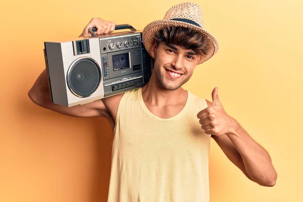 Young Hispanic Man Holding Boombox Listening Music Smiling Happy Positive — Stock Photo, Image