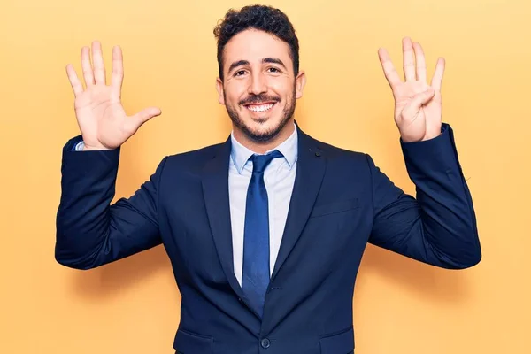 Young Hispanic Man Wearing Suit Showing Pointing Fingers Number Nine — Stock Photo, Image