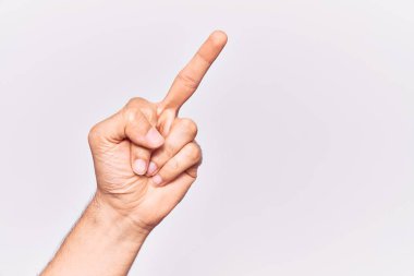 Close up of hand of young caucasian man over isolated background showing provocative and rude gesture doing fuck you symbol with middle finger 