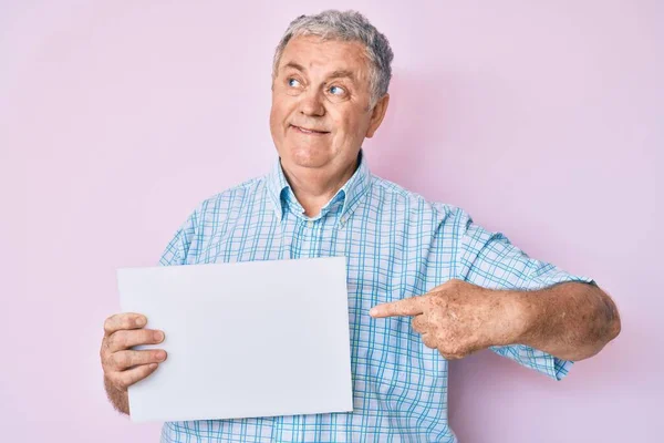 Senior Grey Haired Man Holding Blank Empty Banner Smiling Looking — Stock Photo, Image