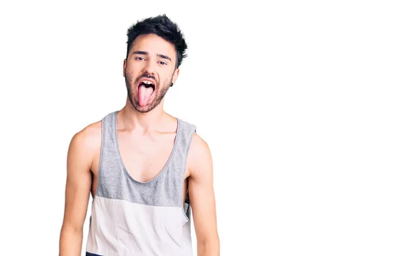 Joven Hombre Hispano Usando Ropa Casual Sacando Lengua Feliz Con —  Fotos de Stock