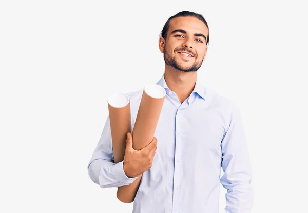 Young Handsome Man Holding Paper Blueprints Looking Positive Happy Standing — Stock Photo, Image