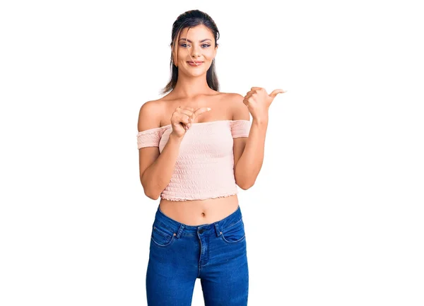 Young Beautiful Woman Wearing Casual Clothes Pointing Back Hand Thumbs — Stock Photo, Image