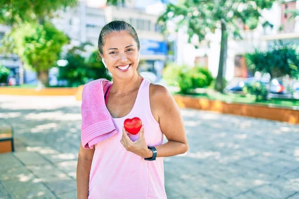 Middle Age Sportswoman Asking Health Care Holding Heart Park — Stock Photo, Image