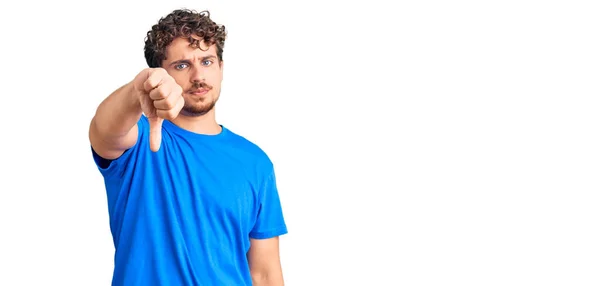 Young Handsome Man Curly Hair Wearing Casual Clothes Looking Unhappy — Stock Photo, Image