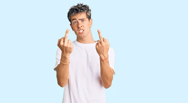 Young Handsome Man Wearing Casual White Tshirt Showing Middle Finger — Stock Fotó