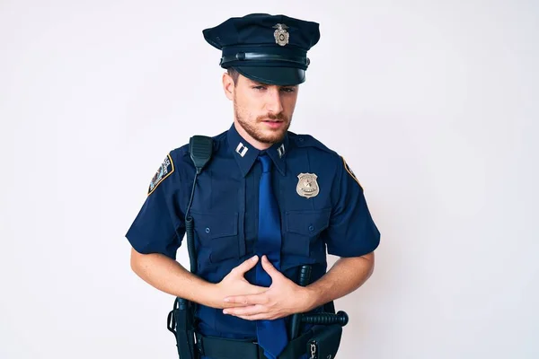 Homem Caucasiano Jovem Vestindo Uniforme Policial Com Mão Estômago Porque — Fotografia de Stock