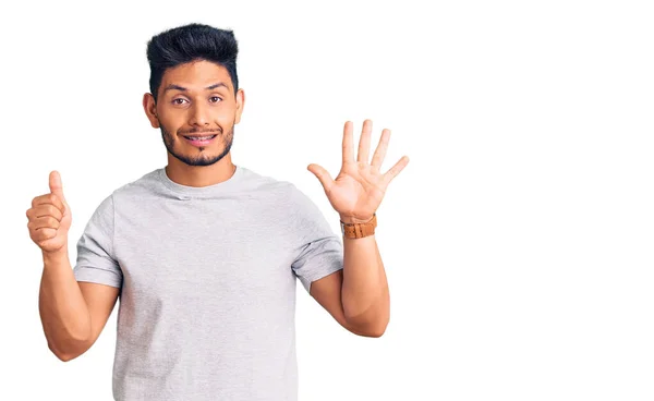 Handsome Latin American Young Man Wearing Casual Tshirt Showing Pointing — Stock Photo, Image