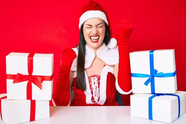 Young Woman Wearing Santa Claus Costume Sitting Desk Gifts Celebrating — Stock Photo, Image