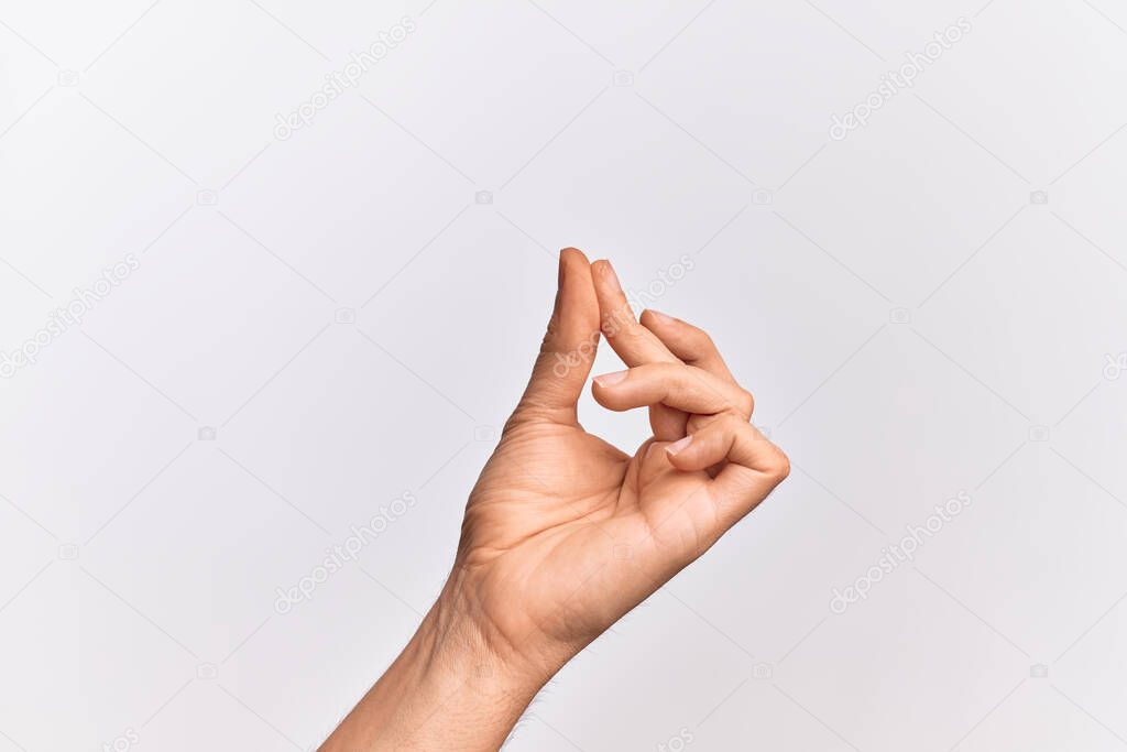 Hand of caucasian young man showing fingers over isolated white background snapping fingers for success, easy and click symbol gesture with hand