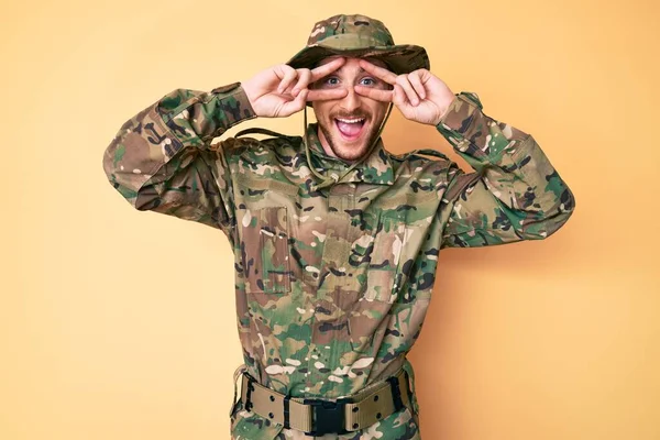 Young Caucasian Man Wearing Camouflage Army Uniform Doing Peace Symbol — Stock Photo, Image