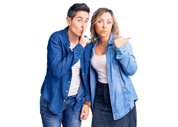 Couple Women Wearing Casual Clothes Asking Quiet Finger Lips Pointing — Stock Photo, Image
