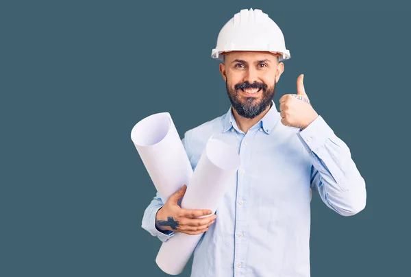 Young Handsome Man Wearing Hardhat Holding Paper Blueprints Smiling Happy — Stock Photo, Image
