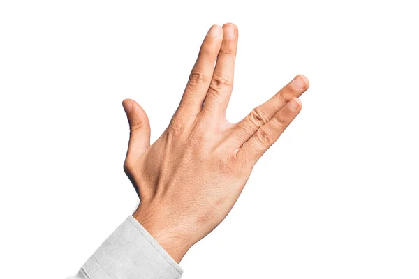 考卡族年轻人的手在孤立的白色背景的问候上伸出手指 向瓦肯致敬 向后伸出手和手指 表现出怪异的文化 — 图库照片
