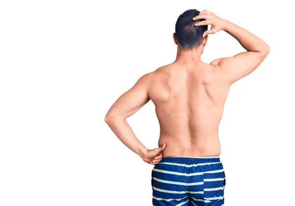 Young Handsome Man Wearing Swimwear Backwards Thinking Doubt Hand Head — Stock Photo, Image