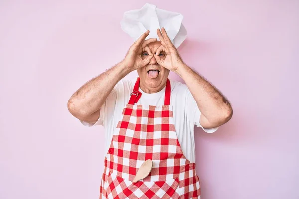 Senior Grey Haired Man Wearing Professional Baker Apron Doing Gesture — Stock Photo, Image