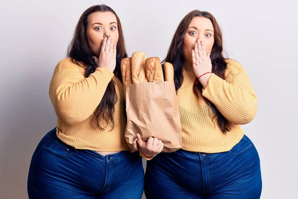 Young Size Twins Holding Paper Bag Bread Covering Mouth Hand — Stock Photo, Image