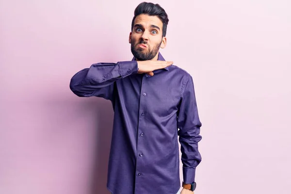 stock image Young handsome man with beard wearing casual shirt cutting throat with hand as knife, threaten aggression with furious violence 