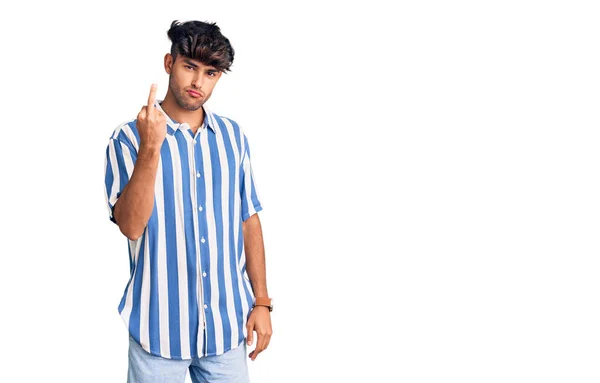 Young Hispanic Man Wearing Casual Clothes Showing Middle Finger Impolite — Stockfoto