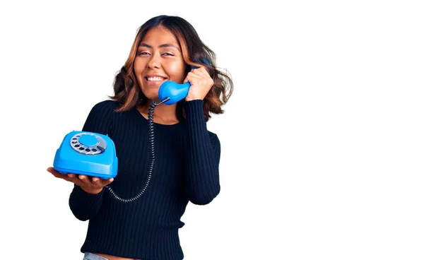 Young Beautiful Mixed Race Woman Holding Vintage Telephone Looking Positive — Stock Photo, Image