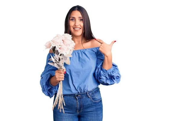 Young Beautiful Brunette Woman Holding Bouquet Pointing Finger One Self — Stock Photo, Image
