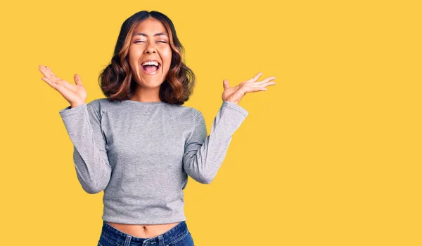 Young Beautiful Mixed Race Woman Wearing Casual Clothes Celebrating Mad — Stock Photo, Image