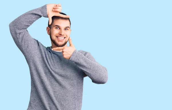 Young Handsome Man Wearing Casual Sweater Smiling Making Frame Hands — Stock Photo, Image