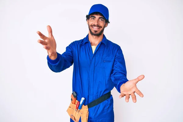 Handsome Young Man Curly Hair Bear Weaing Handyman Uniform Smiling — Stock Photo, Image