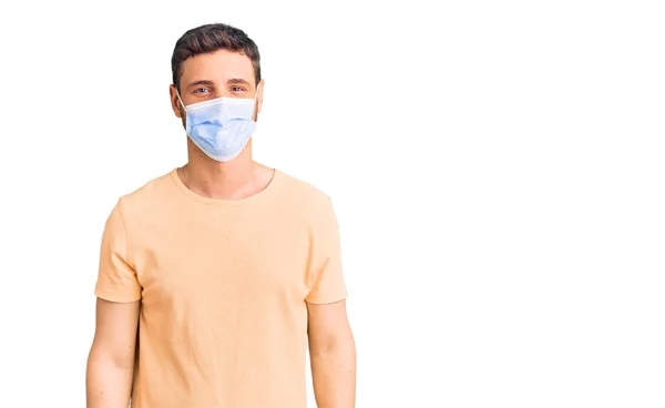 Handsome Young Man Bear Wearing Medical Mask Coronavirus Looking Positive — Stock Photo, Image