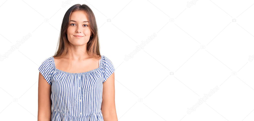 Beautiful caucasian woman wearing casual clothes looking positive and happy standing and smiling with a confident smile showing teeth 