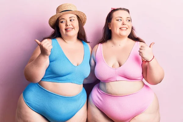 Young Size Twins Wearing Bikini Smiling Happy Face Looking Pointing — Stock Photo, Image
