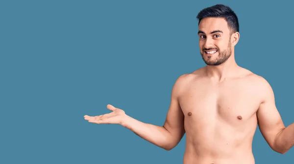 Young Handsome Man Wearing Swimwear Smiling Showing Both Hands Open — Stock Photo, Image