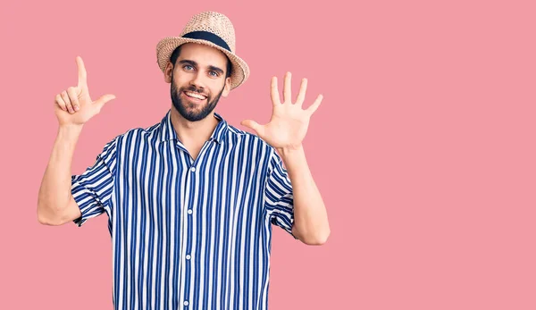 Young Handsome Man Beard Wearing Summer Hat Striped Shirt Showing — Stock Photo, Image